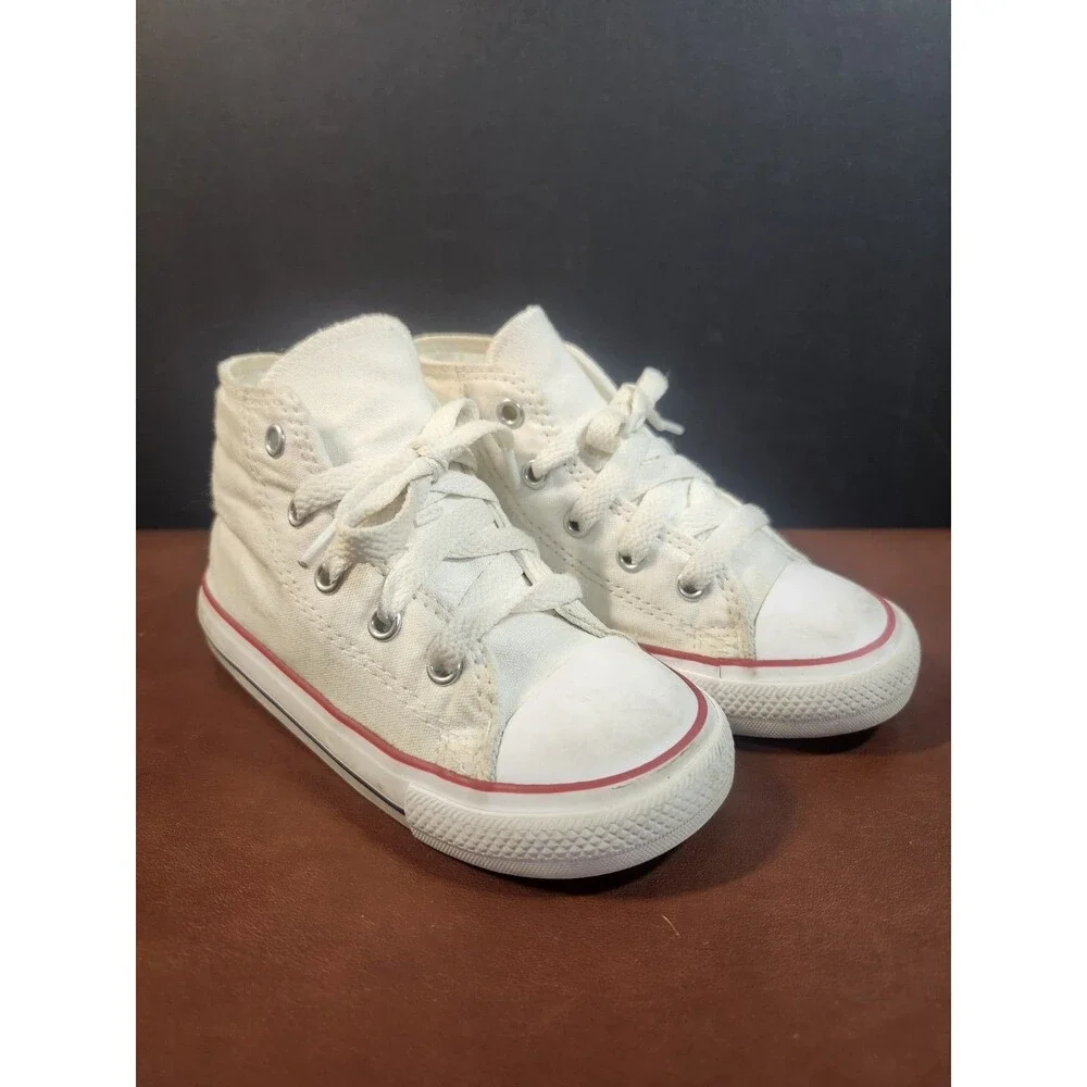 white canvas Converse Chuck Taylor All Star high-top sneakers